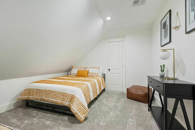 724 N Old Robinson Rd, Robinson, TX 76706 - carpeted bedroom with lofted ceiling and recessed lighting