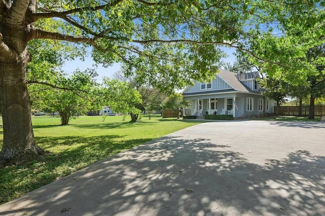 724 N Old Robinson Rd, Robinson, TX 76706 - view of front of home featuring a porch and driveway