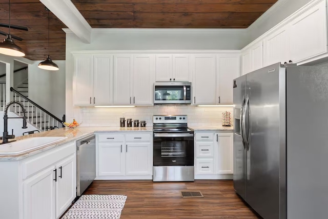 724 N Old Robinson Rd, Robinson, TX 76706 - kitchen featuring appliances with stainless steel finishes, wood ceiling, white cabinetry, a sink, and beam ceiling