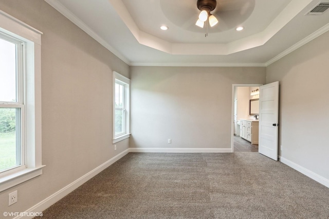 344 Whispering Oaks Trl, Sunset, TX 76270 - empty room with a tray ceiling, a ceiling fan, dark carpet, recessed lighting, and baseboards