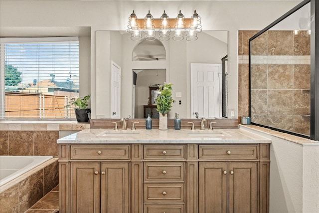 3507 Jasmine Ln, Rowlett, TX 75089 - full bathroom with a bath, double vanity, and a tile shower