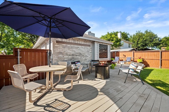 3507 Jasmine Ln, Rowlett, TX 75089 - wooden terrace with a fire pit and fence