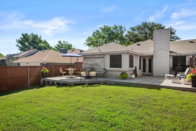 3507 Jasmine Ln, Rowlett, TX 75089 - rear view of property featuring a deck, french doors, a chimney, and roof with shingles
