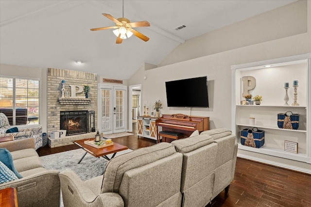 3507 Jasmine Ln, Rowlett, TX 75089 - living room featuring a ceiling fan, dark wood-type flooring, and a fireplace