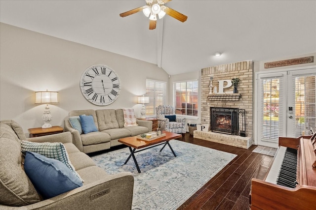3507 Jasmine Ln, Rowlett, TX 75089 - living area with a ceiling fan, dark wood finished floors, a brick fireplace, and vaulted ceiling