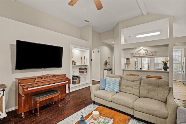 3507 Jasmine Ln, Rowlett, TX 75089 - living area with ceiling fan, wood finished floors, and baseboards