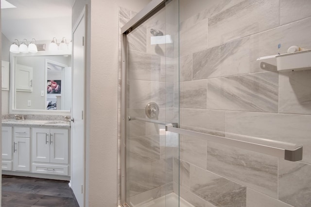 626 Lochngreen Trl, Arlington, TX 76012 - bathroom featuring a stall shower and vanity