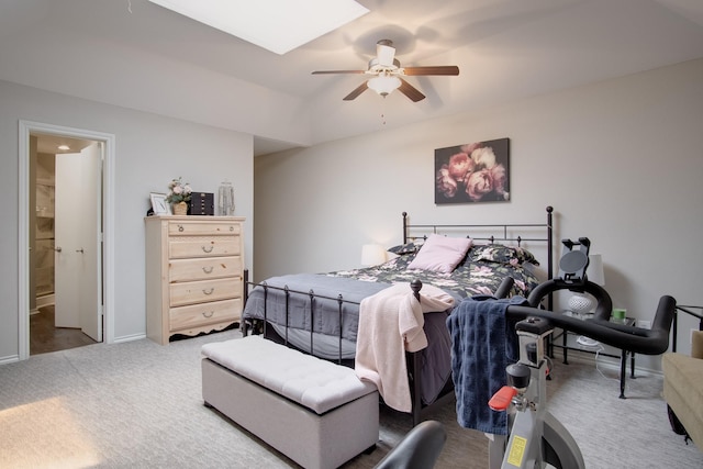 626 Lochngreen Trl, Arlington, TX 76012 - carpeted bedroom with a ceiling fan, a skylight, and ensuite bathroom