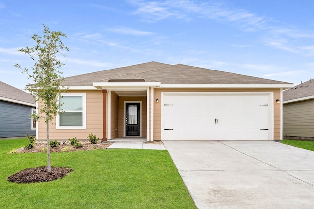 4809 Fillmore Dr, Greenville, TX 75401 - ranch-style house with driveway, a front lawn, and a garage