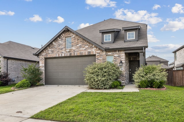 3903 Rochelle Ln, Forney, TX 75126 - view of front of home featuring brick siding, driveway, a garage, and a shingled roof