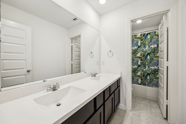 3903 Rochelle Ln, Forney, TX 75126 - full bathroom featuring double vanity, tile patterned flooring, recessed lighting, baseboards, and shower / bathtub combination with curtain