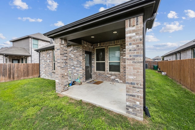 3903 Rochelle Ln, Forney, TX 75126 - back of property with brick siding and a patio