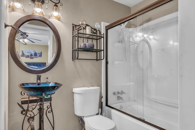 836 Silver Creek Rd, Azle, TX 76020 - bathroom with toilet, a sink, and bath / shower combo with glass door