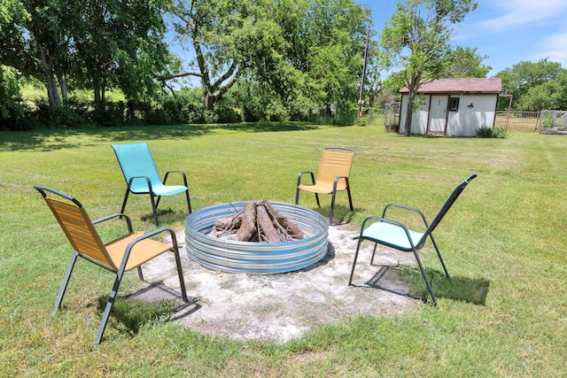 836 Silver Creek Rd, Azle, TX 76020 - view of yard featuring an outdoor fire pit, an outbuilding, and a storage unit