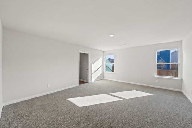 4701 Fillmore Dr, Greenville, TX 75401 - carpeted empty room with baseboards and recessed lighting