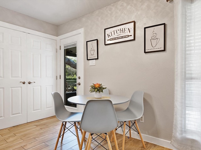 5601 Briarcrest Dr, Garland, TX 75043 - dining room featuring light wood-style flooring