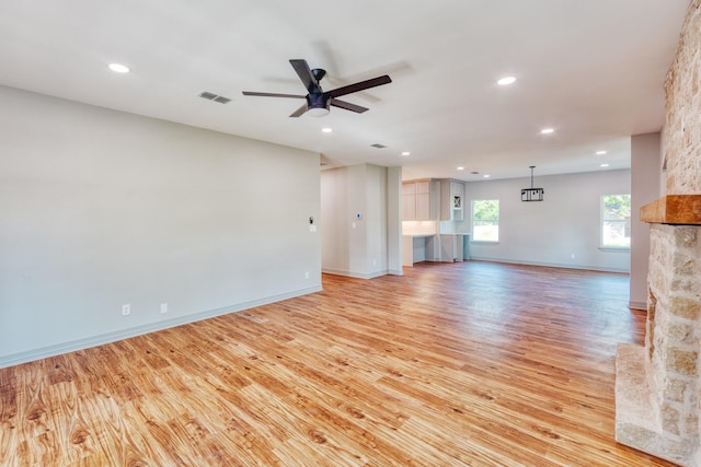 808 N Main St, Tioga, TX 76233 - unfurnished living room with light wood finished floors, recessed lighting, a ceiling fan, and baseboards