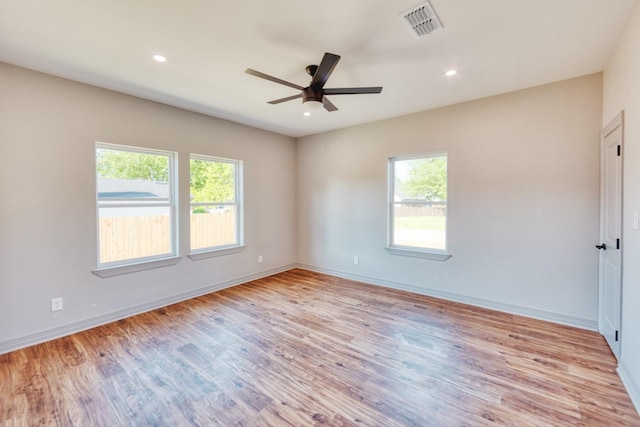 808 N Main St, Tioga, TX 76233 - unfurnished room featuring healthy amount of natural light, ceiling fan, wood finished floors, baseboards, and recessed lighting