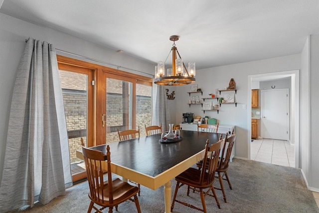 3410 Country Club Pl, Grand Prairie, TX 75052 - dining space with a chandelier, light carpet, and baseboards