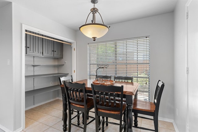 3410 Country Club Pl, Grand Prairie, TX 75052 - dining space with light tile patterned floors and baseboards