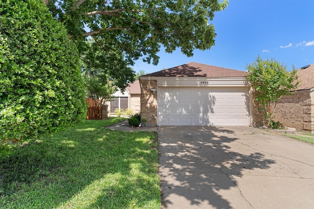3410 Country Club Pl, Grand Prairie, TX 75052 - view of front of house featuring driveway and brick siding