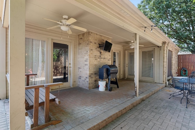 3410 Country Club Pl, Grand Prairie, TX 75052 - view of patio with a ceiling fan, area for grilling, and fence