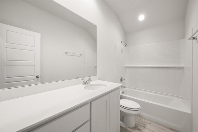 9332 Bali Dr, Fort Worth, TX 76123 - bathroom with wood finished floors, toilet, bathtub / shower combination, and vanity