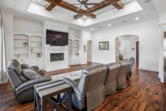 living area with arched walkways, coffered ceiling, baseboards, a ceiling fan, and recessed lighting