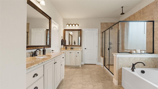 5100 Ambergate Ln, Sherman, TX 75092 - bathroom featuring a stall shower, a garden tub, and vanity