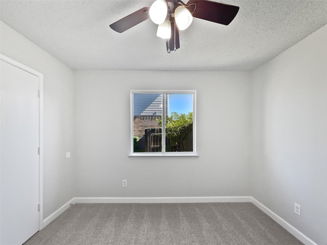 110 Nighthawk Dr, Krum, TX 76249 - carpeted spare room featuring ceiling fan, baseboards, and a textured ceiling