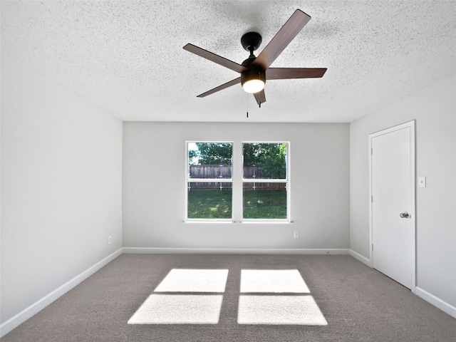 110 Nighthawk Dr, Krum, TX 76249 - unfurnished room with a textured ceiling, ceiling fan, carpet floors, and baseboards