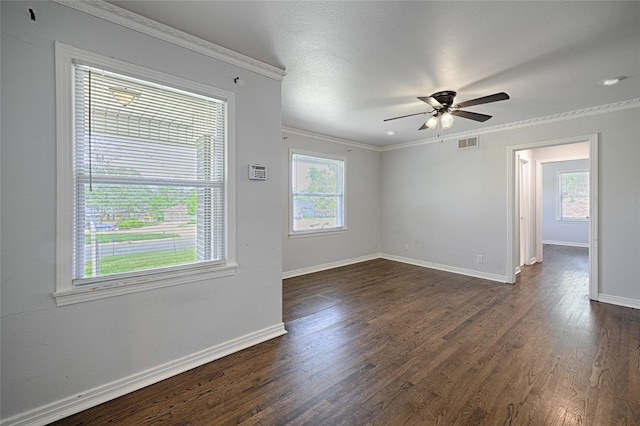 315 Westway Dr, Rockwall, TX 75087 - spare room with healthy amount of natural light, dark wood finished floors, ornamental molding, and baseboards