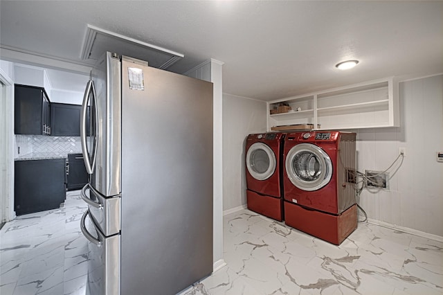 315 Westway Dr, Rockwall, TX 75087 - laundry room featuring light marble finish flooring, baseboards, and separate washer and dryer