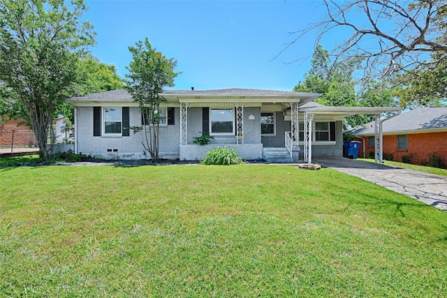 315 Westway Dr, Rockwall, TX 75087 - view of front of property with brick siding, driveway, a carport, and a front lawn