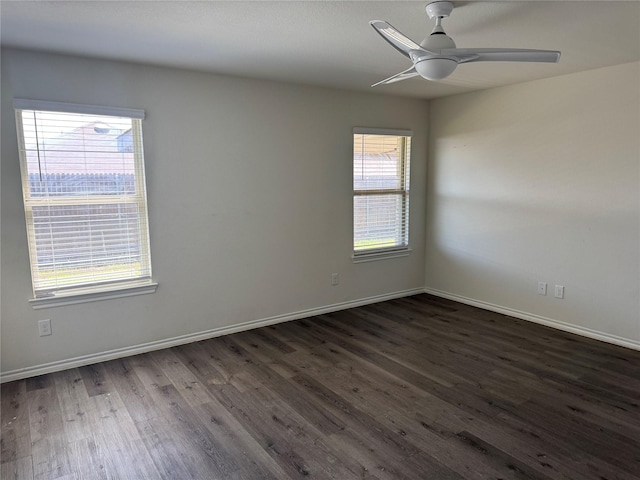 2419 Karnack Dr, Forney, TX 75126 - spare room with dark wood-style floors, baseboards, and a ceiling fan