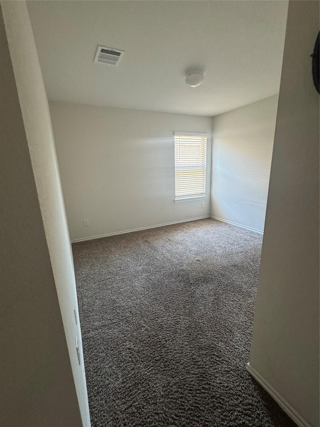 2419 Karnack Dr, Forney, TX 75126 - carpeted empty room with baseboards