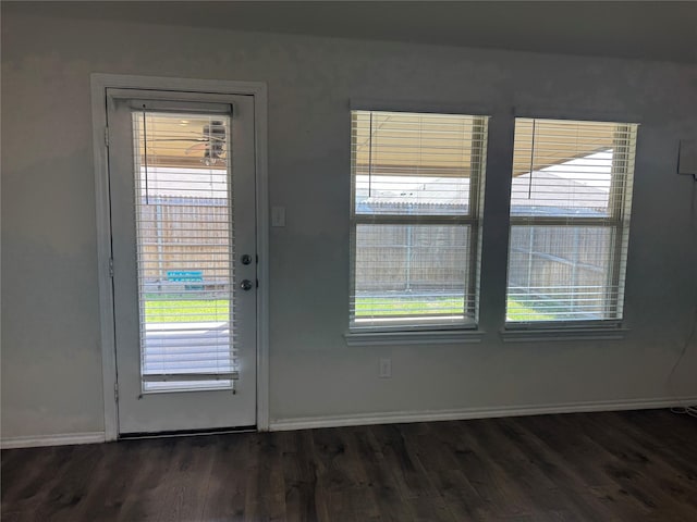 2419 Karnack Dr, Forney, TX 75126 - doorway featuring dark wood-type flooring and baseboards