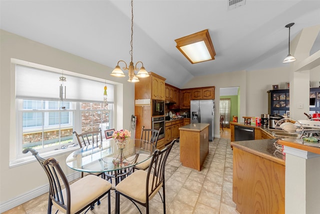1409 Kingsley Dr, Allen, TX 75013 - dining area featuring lofted ceiling, a chandelier, and baseboards