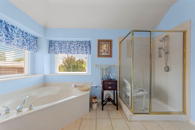 1409 Kingsley Dr, Allen, TX 75013 - bathroom with a shower stall, a bath, tile patterned floors, and baseboards