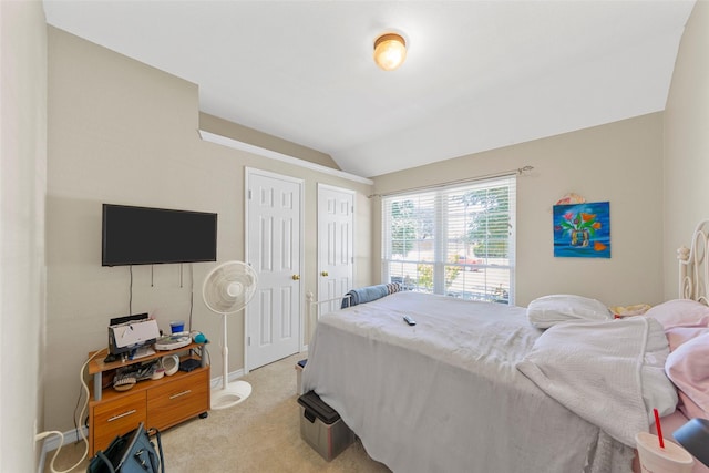 1409 Kingsley Dr, Allen, TX 75013 - bedroom featuring light colored carpet, lofted ceiling, and baseboards