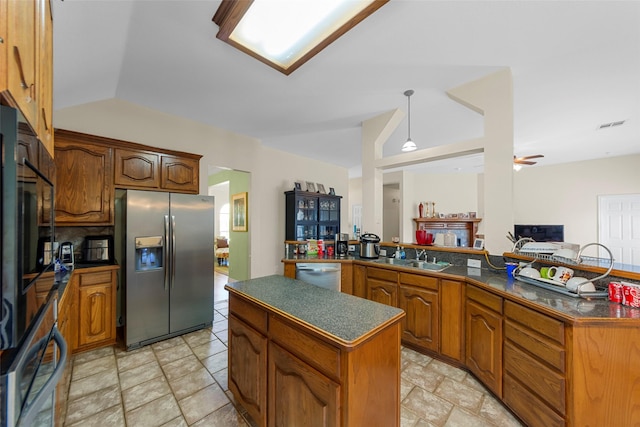 1409 Kingsley Dr, Allen, TX 75013 - kitchen with stainless steel refrigerator with ice dispenser, dark countertops, dishwashing machine, a center island, and a sink