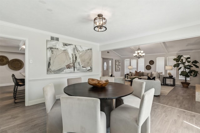 6908 Heatherknoll Dr, Dallas, TX 75248 - dining room featuring a chandelier, wood finished floors, ornamental molding, and baseboards