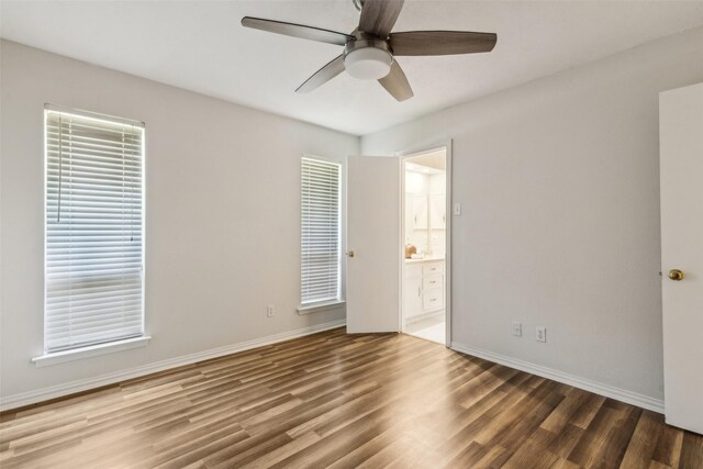 6908 Heatherknoll Dr, Dallas, TX 75248 - empty room featuring a ceiling fan, wood finished floors, and baseboards