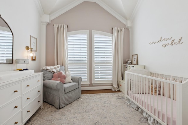 2512 Green Meadow Dr, Sachse, TX 75048 - bedroom with a crib, multiple windows, ornamental molding, and lofted ceiling