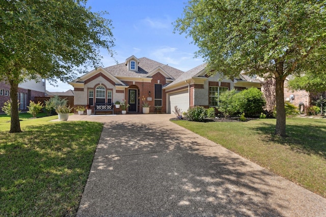 2512 Green Meadow Dr, Sachse, TX 75048 - view of front of property with a front lawn, driveway, brick siding, and a garage