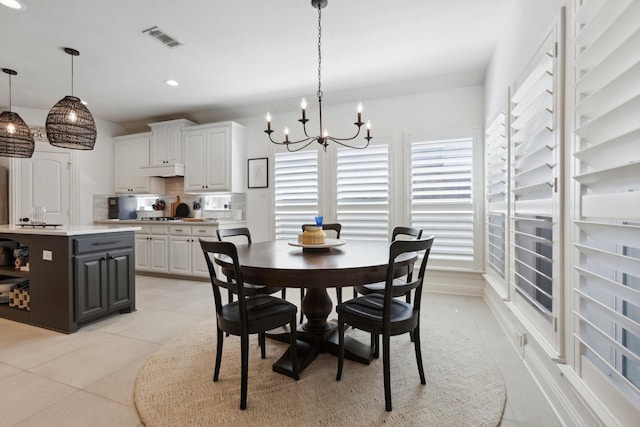 2512 Green Meadow Dr, Sachse, TX 75048 - dining area featuring light tile patterned floors, a chandelier, and recessed lighting