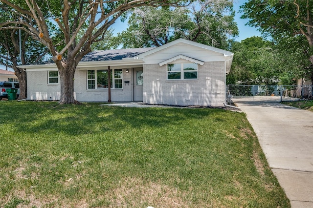 5217 Mack Rd, Haltom City, TX 76117 - ranch-style home featuring concrete driveway and brick siding