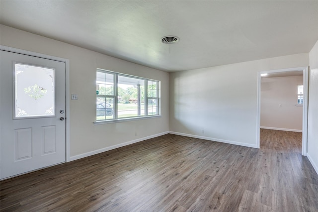 5217 Mack Rd, Haltom City, TX 76117 - entrance foyer with wood finished floors and baseboards
