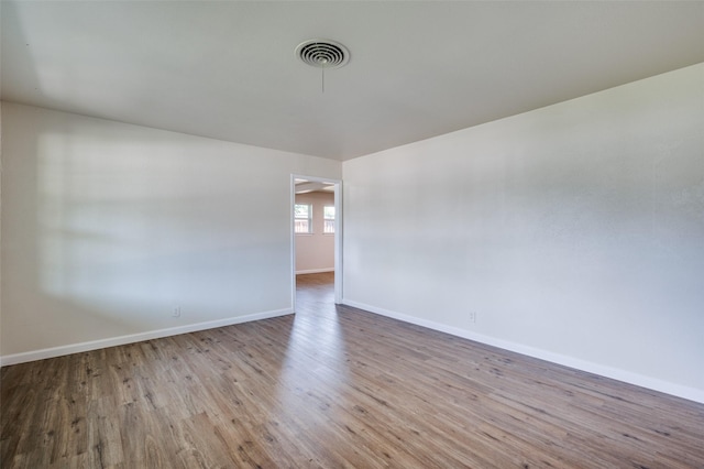 5217 Mack Rd, Haltom City, TX 76117 - spare room with wood finished floors and baseboards