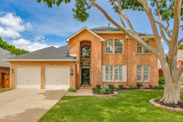 view of front of property featuring a garage, brick siding, concrete driveway, a front yard, and a shingled roof
